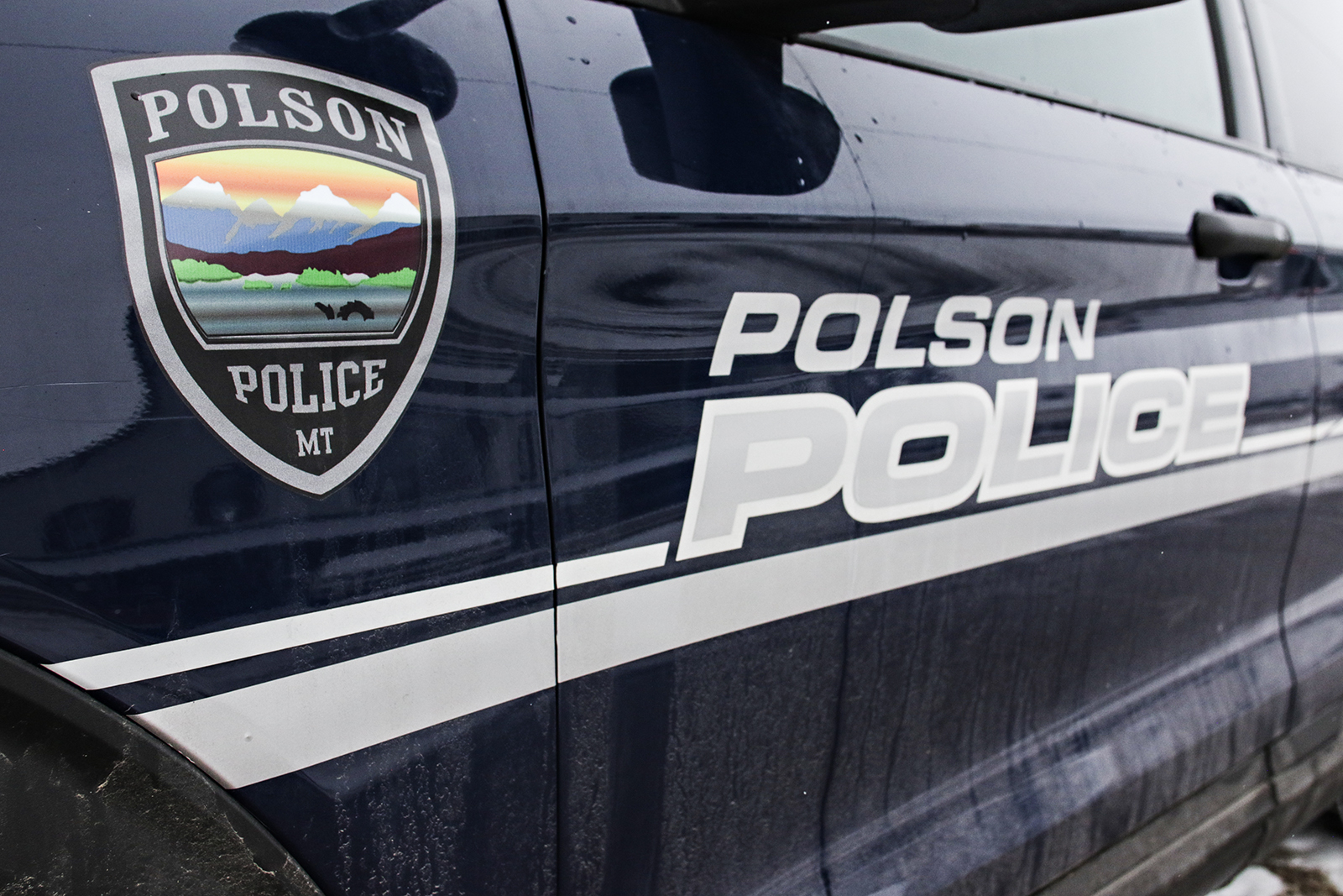 Polson Police Department vehicle featuring the official department crest